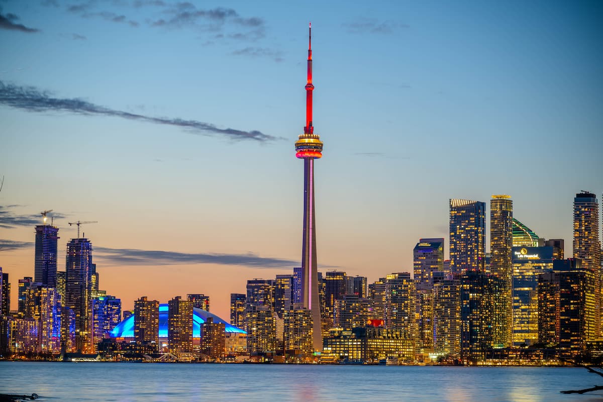 Toronto skyline at dusk with CN Tower illuminated, representing Canadian businesses adopting AI for customer insights